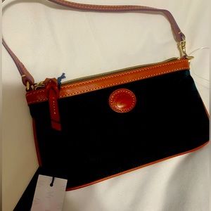 Dooney & Burke! Black wristlet.  Embossed w Steelers!